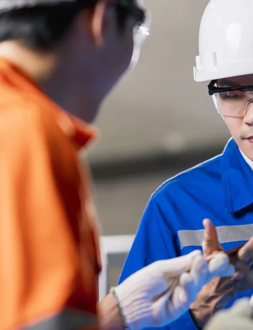 male-asian-engineer-professional-having-discussion-standing-by-machine-factory-two-asian-coworker-brainstorm-explaining-solves-process-curcuit-mother-board-machine